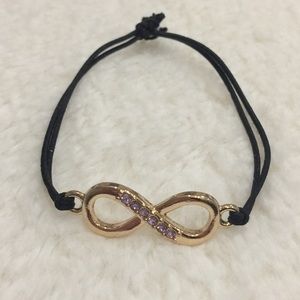 Gold plated Infinity Bracelet w/ Purple Crystals